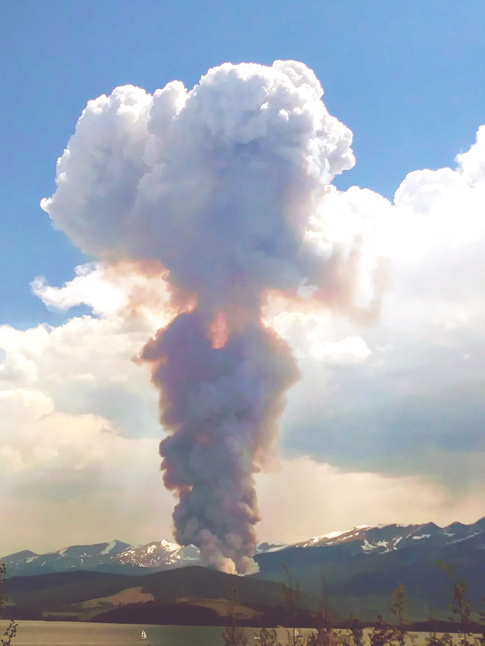 Smoke plume from mountain fire.