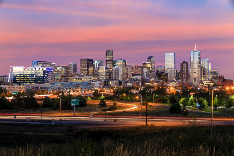 Downtown denver skyscrapers at dusk.