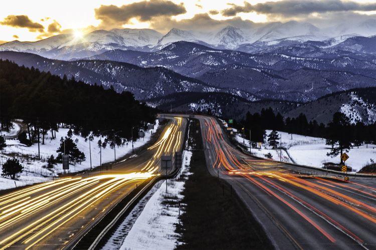 Time lapse of traffic on I-70 at dusk.